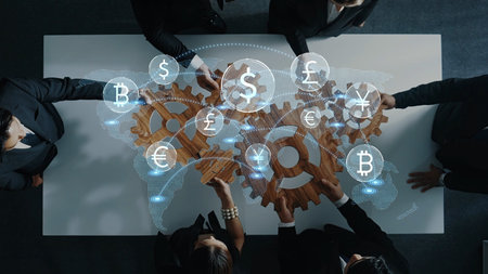 A strategic meeting scene showcasing diverse currency symbols and gears as people collaborate on financial planning and global market integration with digital elements. Rasterの写真素材