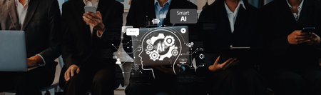 A group of business professionals seated in a modern office environment, engaging with various digital devices, enhanced by a visual representation of artificial intelligence concepts.の写真素材