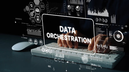 Hands Typing on Keyboard with Data Orchestration Concept and Digital Analytics in Background....