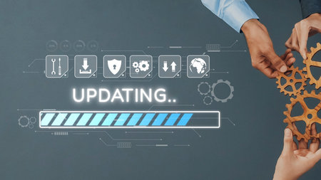 Two hands assemble gears against a digital backdrop with an updating progress bar, representing collaboration and the ongoing evolution in technology. Rasterの写真素材