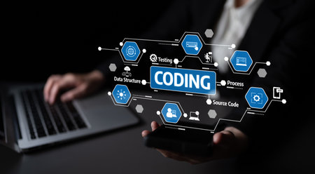 A focused business professional using a laptop and smartphone to illustrate coding concepts,...