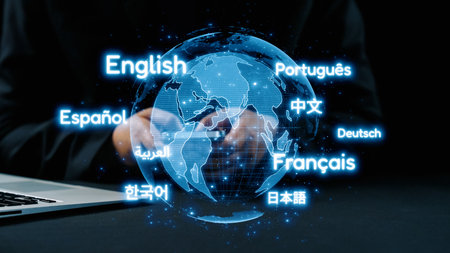 A futuristic representation of a holographic globe in various languages, illustrating the importance of communication and connectivity in a globalized world.の写真素材