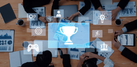 Professionals engage in collaborative project analysis, showcasing data-driven strategies and digital visuals that emphasize teamwork and achievement in a modern office space.の写真素材