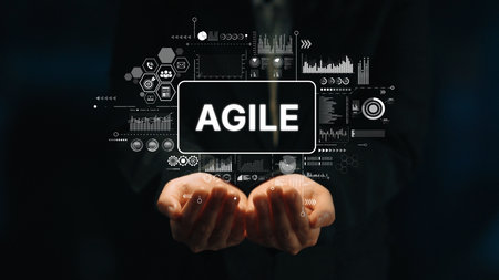 Hands Holding Agile Sign with Data Charts and Graphs Illustrating Business Process Optimization and Project Management Concepts. Asymptotic smart data analytic.の写真素材