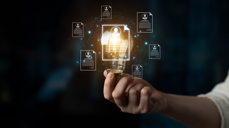 Concept of global talent acquisition and hiring. Human resources department reviewing candidate curriculum vitae and resumes for a job search and workforce selection process.の写真素材