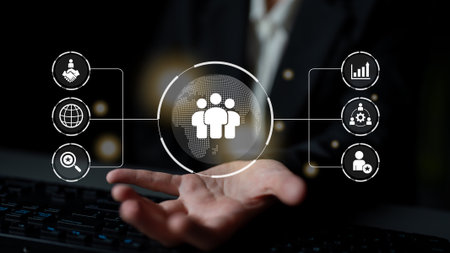 Business teamwork connected around a globe representing cooperation, leadership, and organizational...