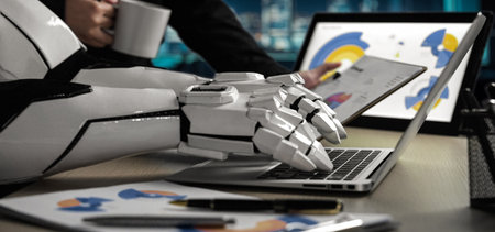 A robotic arm works on a laptop amidst a business setting, representing the fusion of technology and...