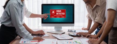 Virus warning alert on computer screen detected brisk cyber threat , hacker, computer virus and...