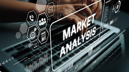 Professional laptop workspace with hands typing on keyboard, market analysis graphics and data visualization overlay. Asymptotic smart data analytic.の写真素材