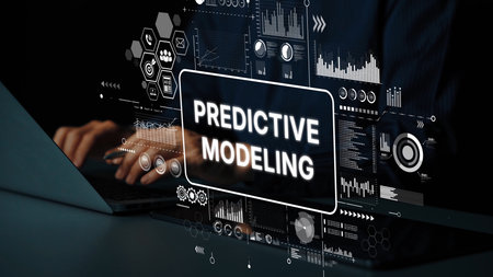 Hands typing on laptop with futuristic interface displaying predictive modeling concepts and data analytics visuals in dark environment. Asymptotic smart data analytic.の写真素材