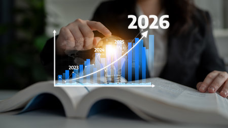 A business professional analyzes financial growth projections from 2023 to 2026, highlighted by...