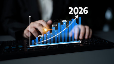 Visualize business growth with a rising bar graph from 2023 to 2026. The image captures a professional workspace focused on financial success and data analysis. Tesselの写真素材