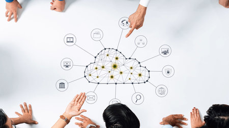 A group of diverse professionals collaborates in a meeting, utilizing a digital cloud concept on a...
