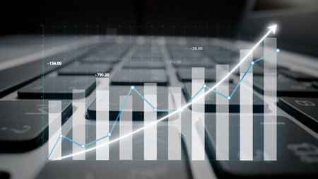 A sleek representation of data analysis featuring a growth graph superimposed on a keyboard,...