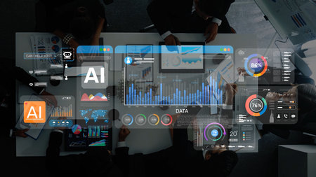 A diverse business team gathers around a table, reviewing data visualizations on digital screens. They explore AI-related insights to enhance strategies and decision-making. Rasterの写真素材
