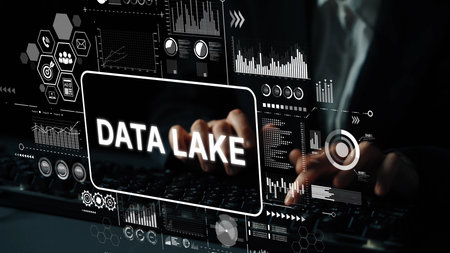Innovative Data Lake Concept with Dark Background and Hands Typing on Computer Keyboard in Modern Digital Environment. Asymptotic smart data analytic.の写真素材