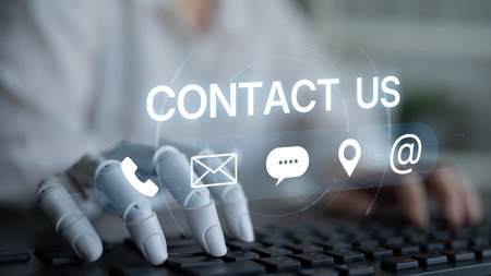 An AI assistant manages multiple communication channels for customer service. This automated contact system provides support via chatbot, email, and phone for instant user help.の写真素材