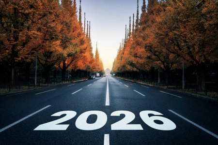 2026 New Year road trip travel and future vision concept . Nature landscape with highway road leading forward to happy new year celebration in the beginning of 2026 for glee and successful start .の写真素材