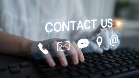 An AI assistant manages multiple communication channels for customer service. This automated contact system provides support via chatbot, email, and phone for instant user help.の写真素材