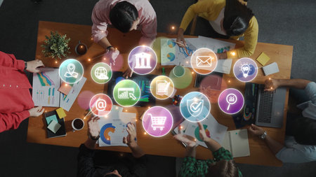 A diverse group of professionals collaborates in an office, analyzing charts and data while surrounded by digital symbols representing modern business concepts. Rasterの写真素材