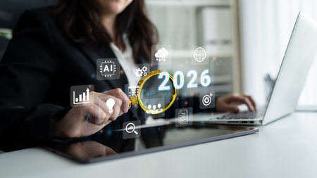 Digital icons, analytics symbols, and glowing number 2026 representing business goals, innovation,...
