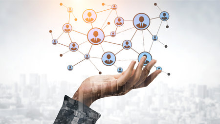 A hand reaches out toward a stylized digital network representing users and connections, symbolizing social interactions and community in a modern city. Tesselの写真素材