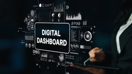 Professional Business Person Interacting with Digital Dashboard Display on a Tablet in Modern Workspace. Asymptotic smart data analytic.の写真素材