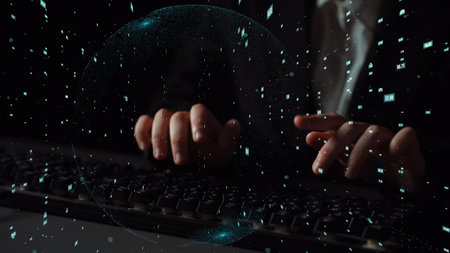 A captivating image depicting hands typing on a keyboard, surrounded by swirling digital particles, conveying a sense of technology and innovation in a dark setting.の写真素材