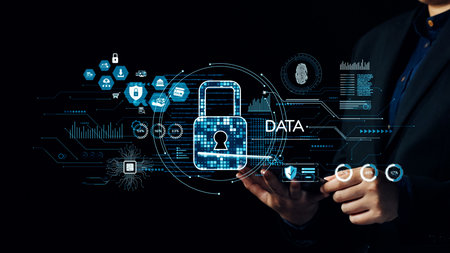 A businessman holds a mobile device in a dark environment, showcasing a digital lock symbolizing data protection and cybersecurity concepts with various graphics and icons.の写真素材