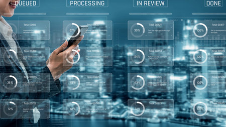 Task management tool dashboard showing kanban-style workflow with columns for to do, in progress, in review, and done, including task cards, progress, and team iconsの写真素材