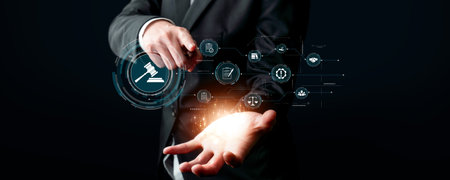 A businessman in a suit points toward a digital interface, showcasing elements of compliance,...