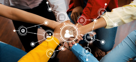 A vibrant group of hands coming together symbolizes collaboration and unity in a digital age. This...