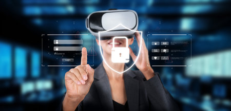 A professional woman engages with a virtual reality headset, exploring cyber security solutions and...