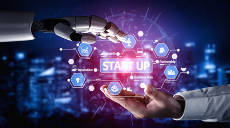 This image depicts a robot hand reaching out to a human hand, symbolizing collaboration in start-up...
