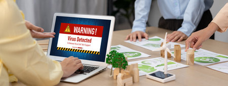 Virus warning alert on computer screen detected brisk cyber threat , hacker, computer virus and...