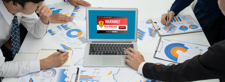 Virus warning alert on computer screen detected brisk cyber threat , hacker, computer virus and...