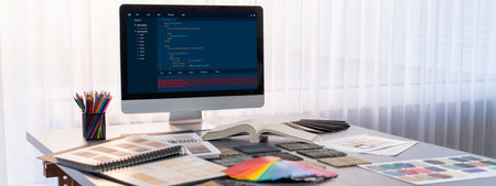 Interior designer workspace table and architecture software on laptop screen with mood board materials and colorful swatch color for color selection. Modern interior design office. Insightの写真素材