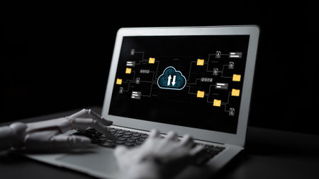 Artificial Intelligence and Cloud Computing Concept with Robot Hand Interacting with Laptop Display...