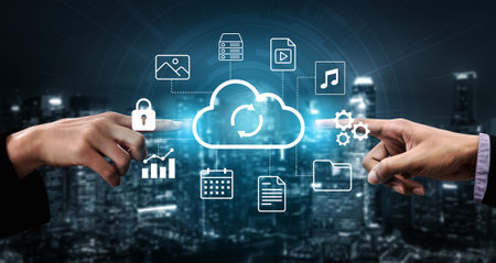 This image showcases two hands connecting through cloud computing, symbolizing collaboration and...