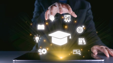 This image depicts a digital interaction showcasing the essence of online education. Hands emanate light while various icons symbolize knowledge and learning advancements.の写真素材