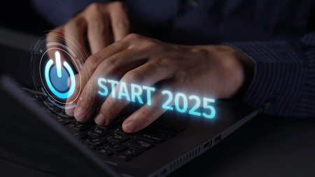 Start 2025 concept with futuristic power button symbolizing fresh beginnings, innovation, and...