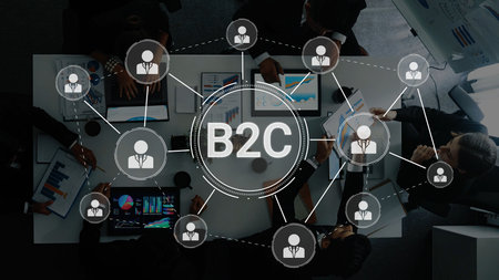 This image depicts a modern office scene showcasing the connection between business and consumer through technology, teamwork, and innovative strategies.の写真素材