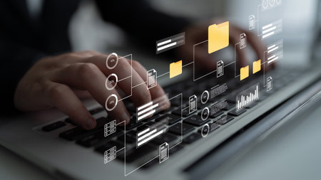 A close-up view of hands typing on a laptop keyboard, surrounded by digital icons representing data...