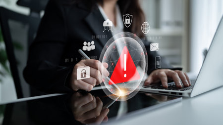 Red warning triangle representing a cybersecurity threat or data breach alert, surrounded by digital security and network protection icons, symbolizing cyber risk awareness Parseの写真素材