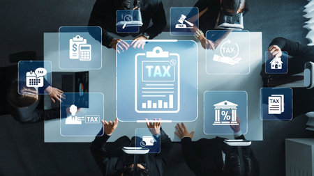 A top-down view of a group engaged in a tax planning meeting, utilizing digital tools and workflows to analyze financial data and develop effective strategies. Rasterの写真素材