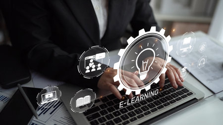 Online education boosts access to learning. Learn anytime through flexible platforms. Education technology transforms how we learn. Digital learning creates new education experiences worldwide.の写真素材