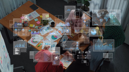 A dynamic team collaborates in a modern office, utilizing data visualization tools to enhance...