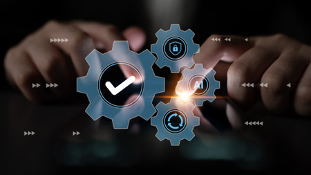 A close-up view of hands interacting with digital gears and checkmarks, representing the concept of...