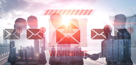 Business professionals engage in a handshake while surrounded by warning symbols and email icons, highlighting communication risks in today urban environments. Gantryの写真素材