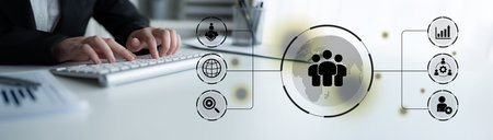 Business teamwork connected around a globe representing cooperation, leadership, and organizational...